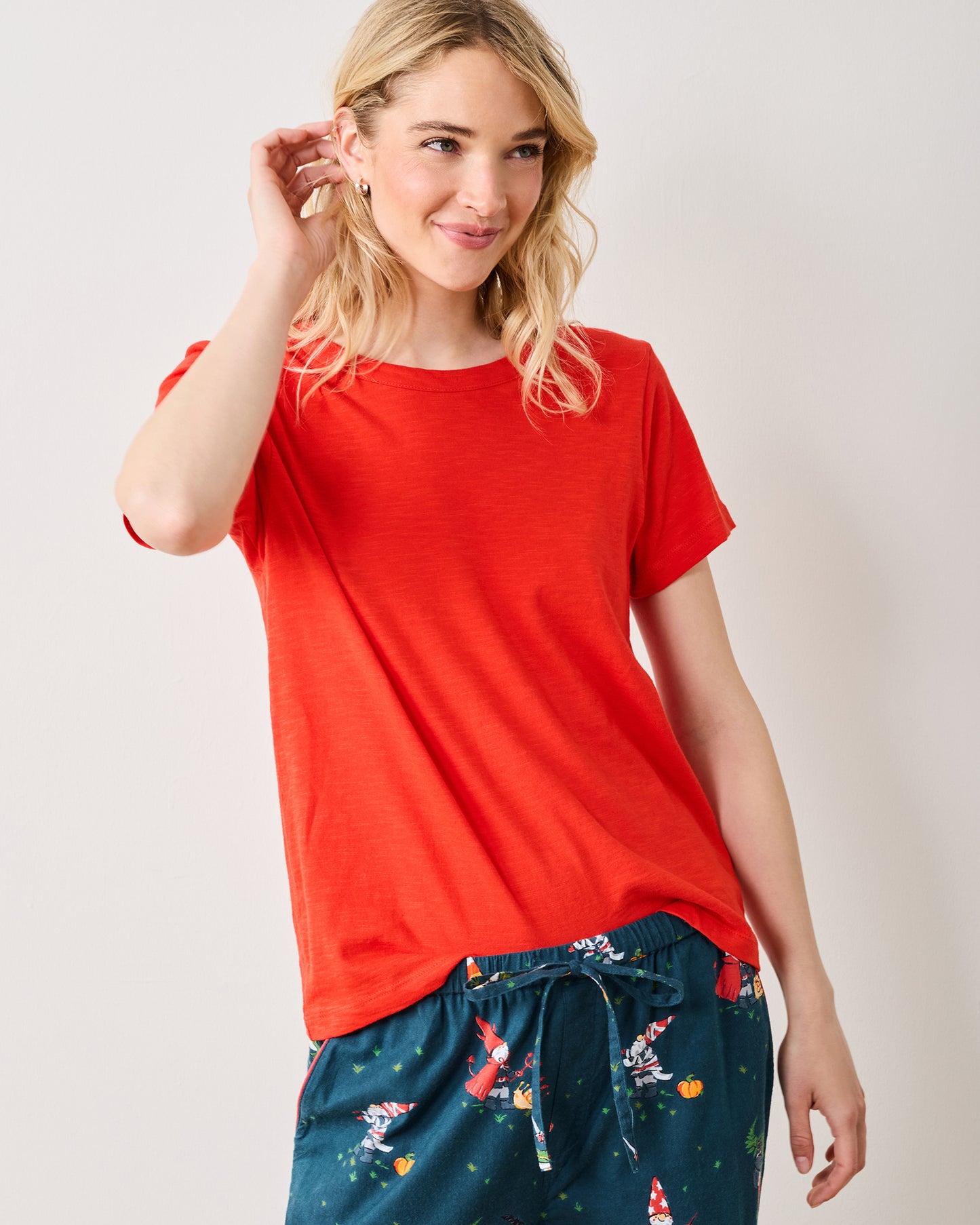 Front view of a red short-sleeve T-shirt with a relaxed straight fit