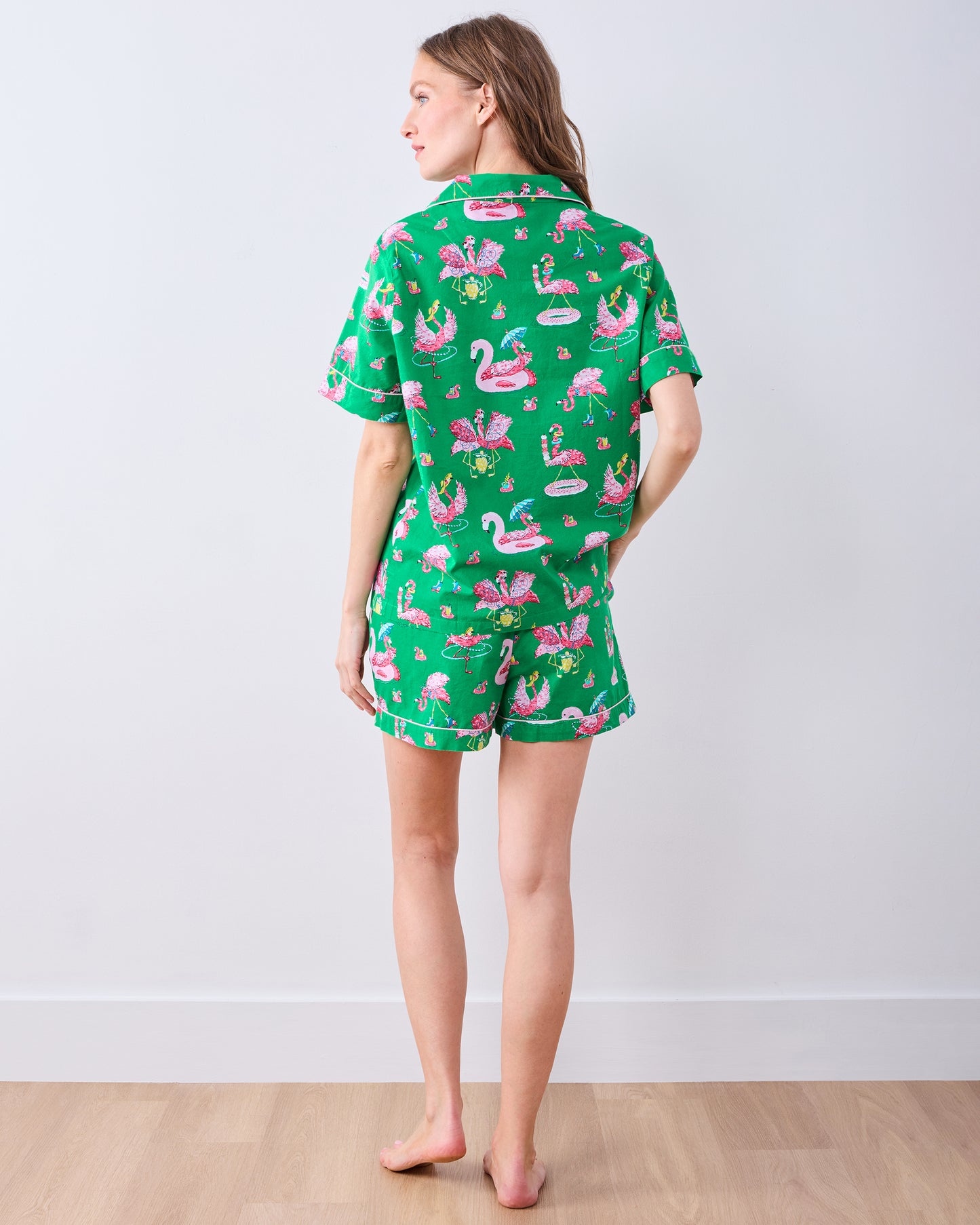 Full rear view of the Palm Frond short pajama set with flamingo print and contrast piping
