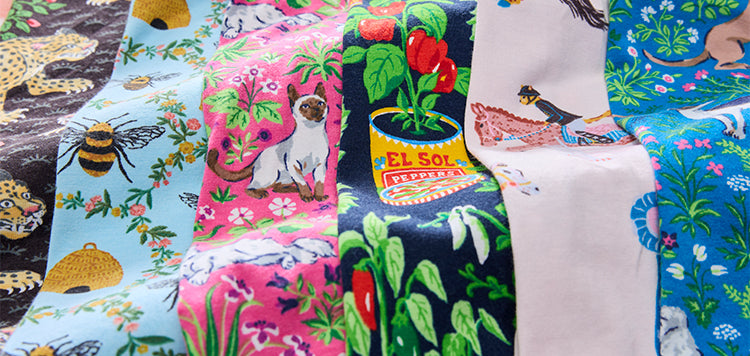 Colorful patterned pajama fabrics displayed side by side. 