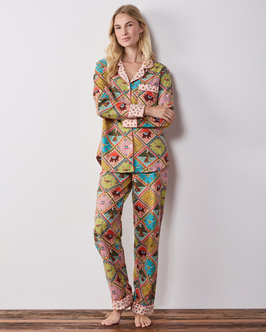 Front view of the olive Western Scenes tall long pajama set with a button-front top, chest pocket, matching pants, and contrasting patterned cuffs and collar.