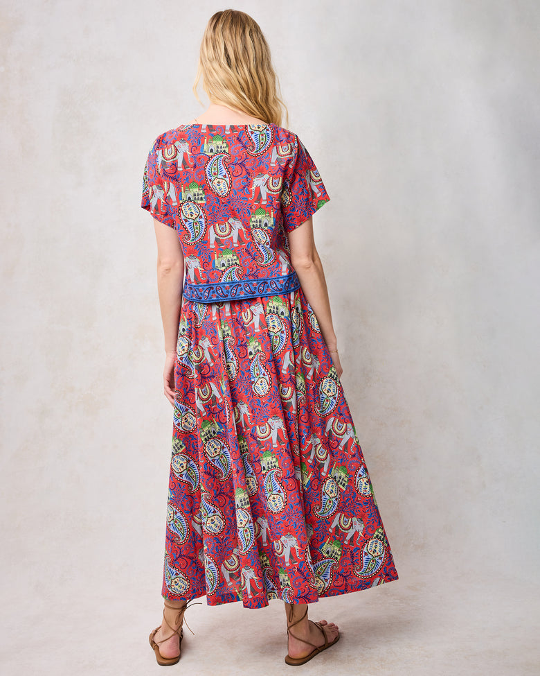 Back view of the red paisley and elephant-print cropped top and matching long skirt