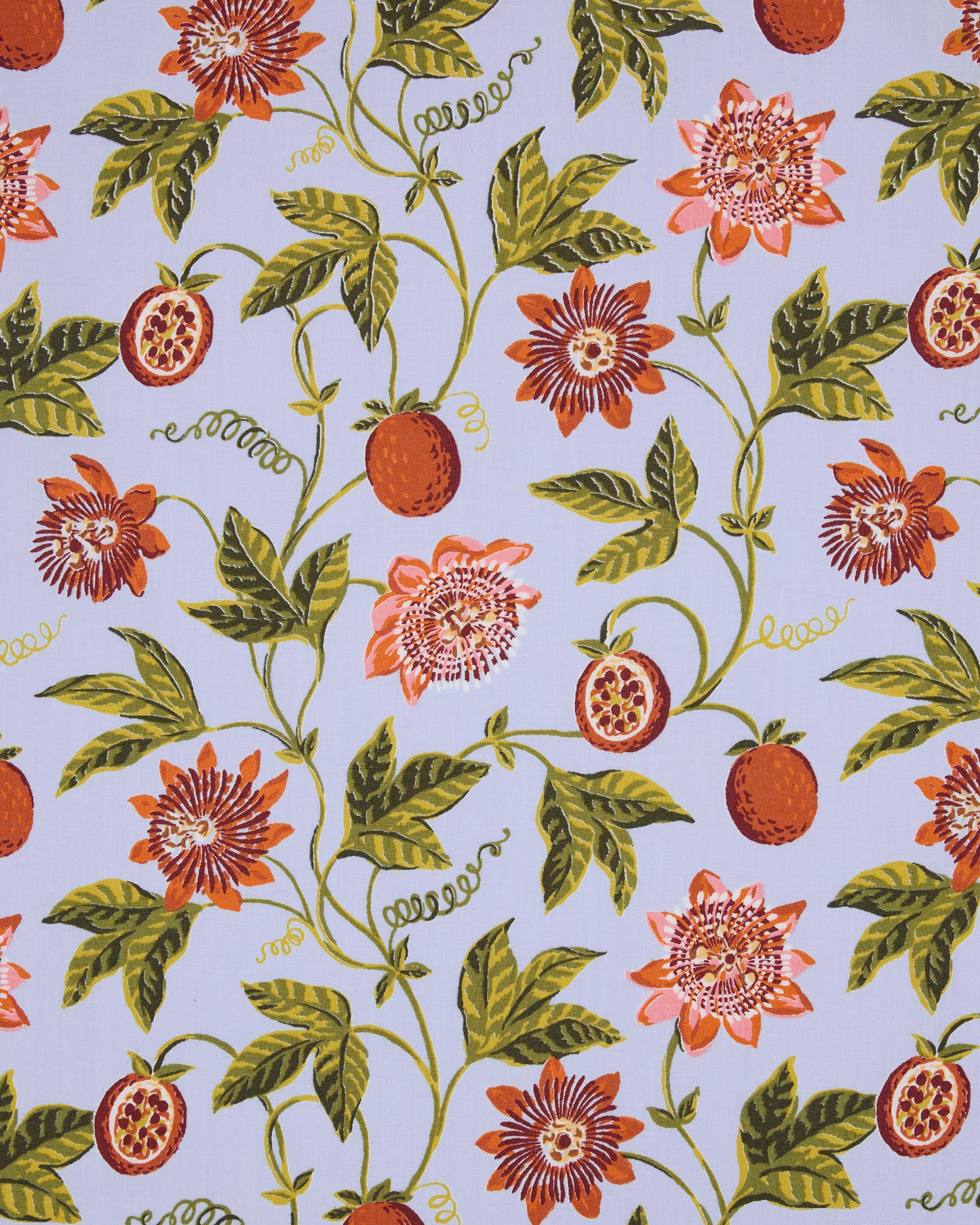 Passion Vine print swatch with orange flowers and fruit, green leaves, and curling vines on a pale blue ground