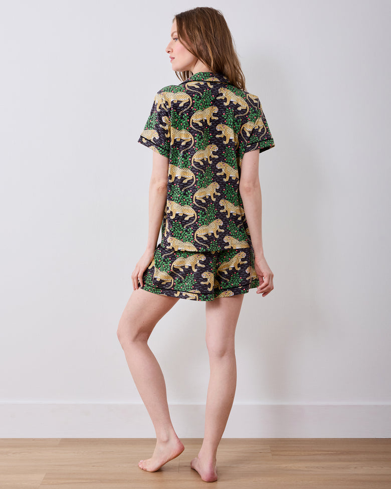 Back view of a person wearing the Bagheera short pajama set with a short-sleeved shirt and matching shorts.