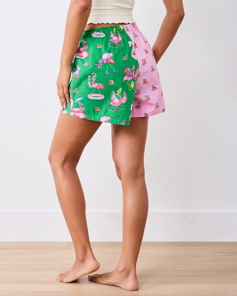 Back view of the pink-and-green flamingo-print boxer shorts
