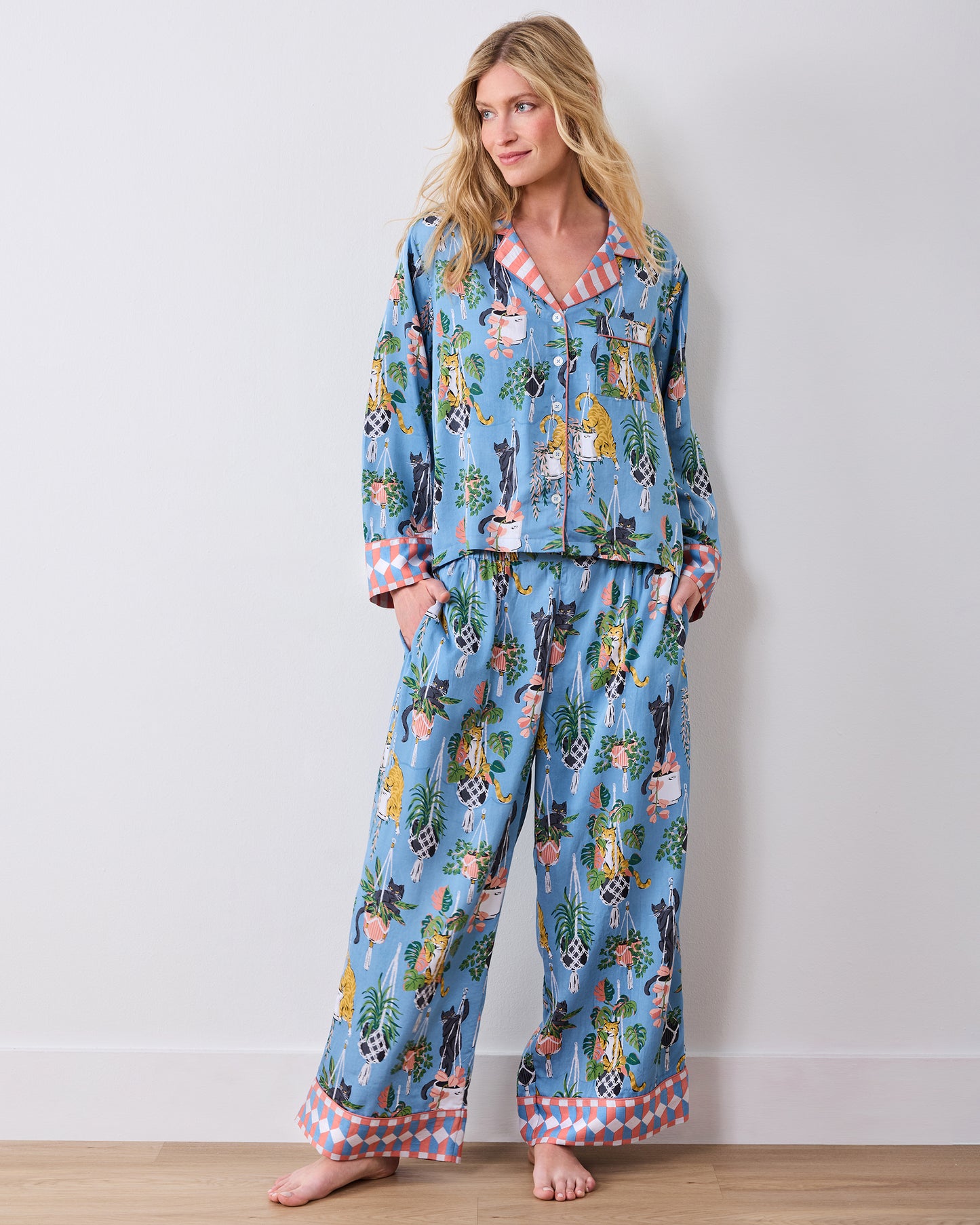 Full front view of the slate blue pajama set with button-front top and wide-leg pants