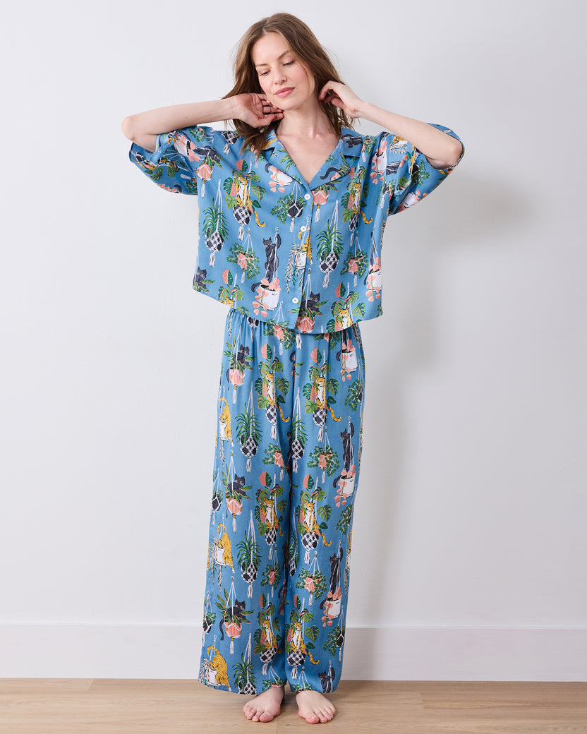 Full front view of the slate blue pajama set with button-front top and wide-leg pants
