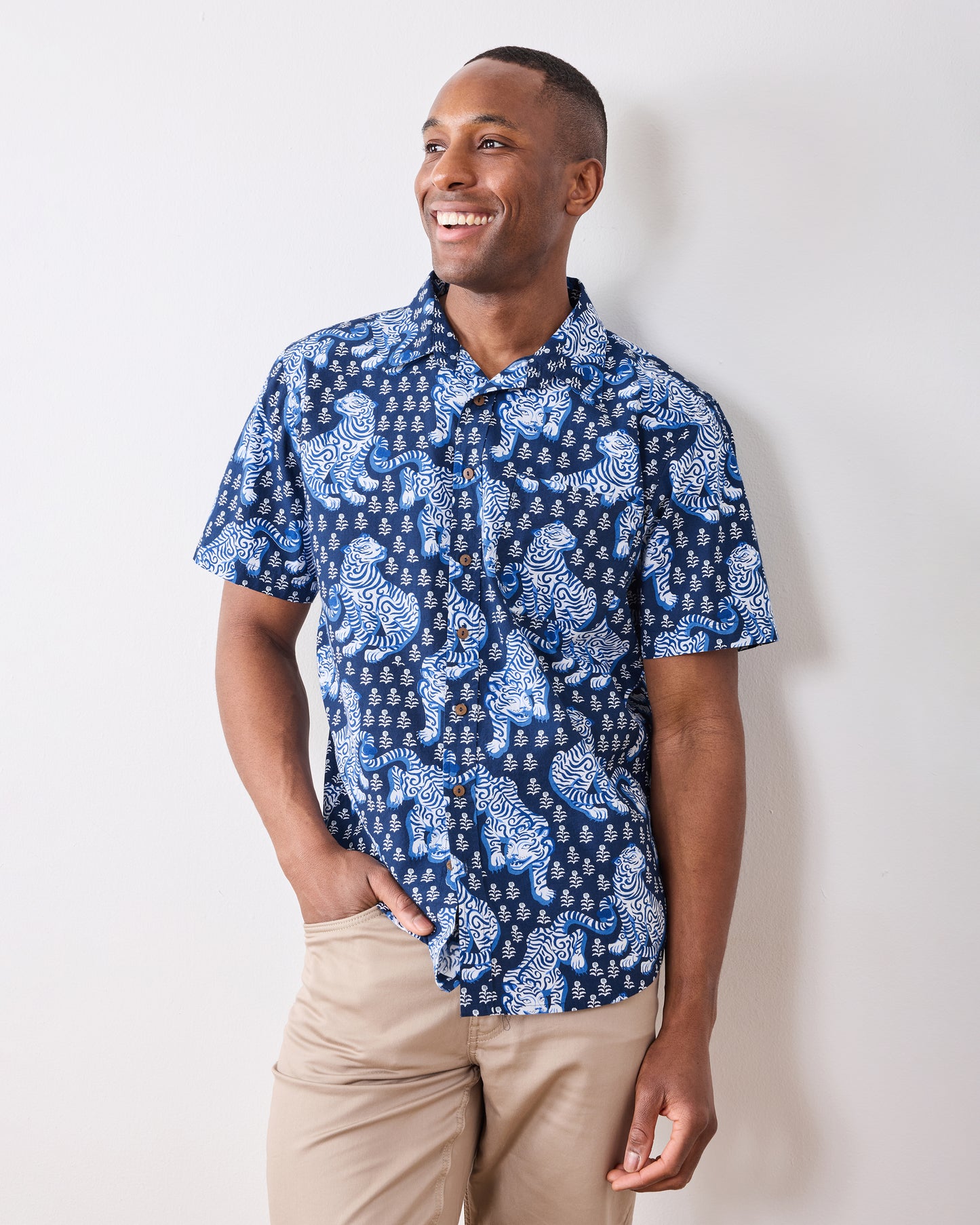 Front three-quarter view of a model wearing the Indigo Tiger Queen Leo Shirt