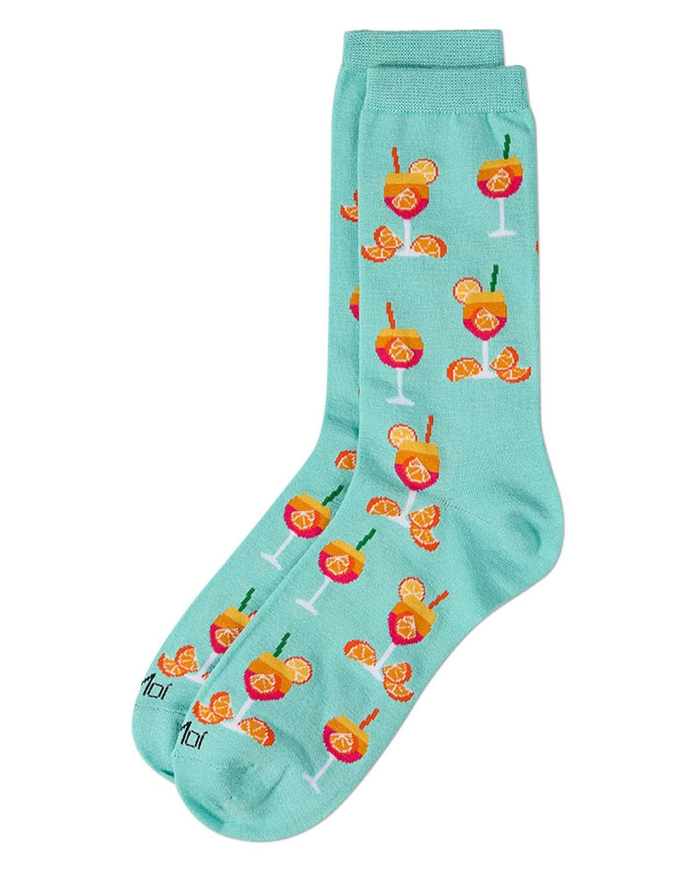 Pair of light blue crew socks displayed together, printed with colorful cocktail glasses, citrus slices, and citrus wedges.