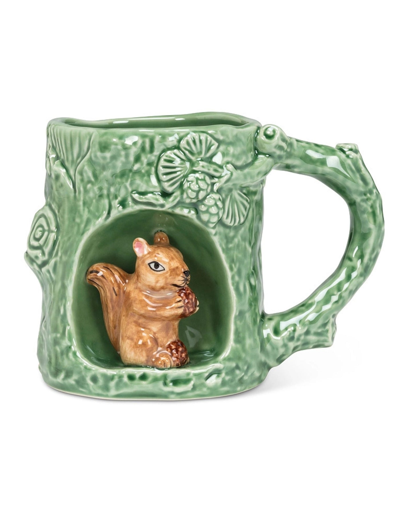 Front view of a green mug with a squirrel figure in a recessed alcove and a handle on the right.