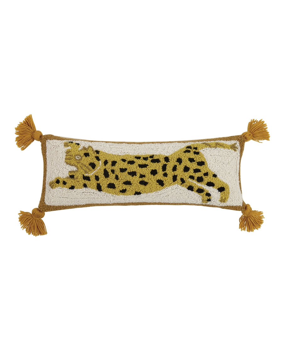 Ivory combo Chi Chi hook pillow with a spotted yellow leopard design and four corner tassels.